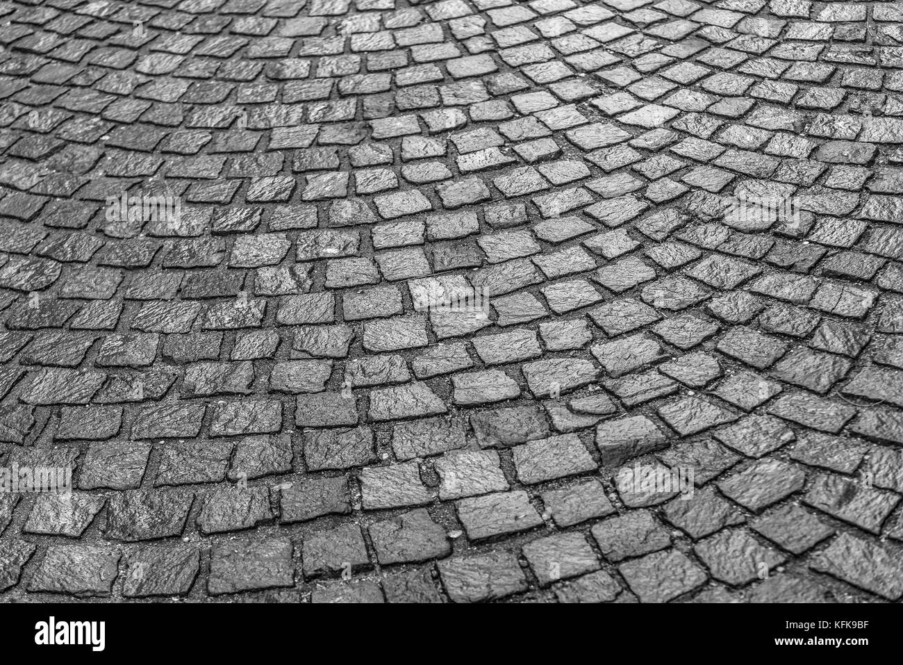 Texture della pavimentazione in pietra lastricatori. Foto Stock