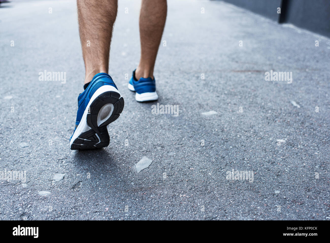 Sportsman jogging al di fuori Foto Stock