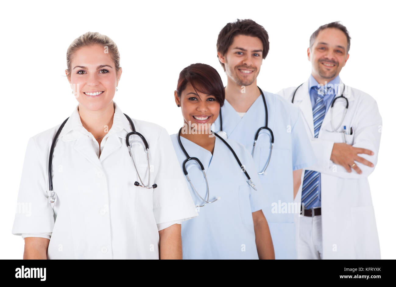 Il gruppo di medici in piedi insieme isolate su sfondo bianco Foto Stock