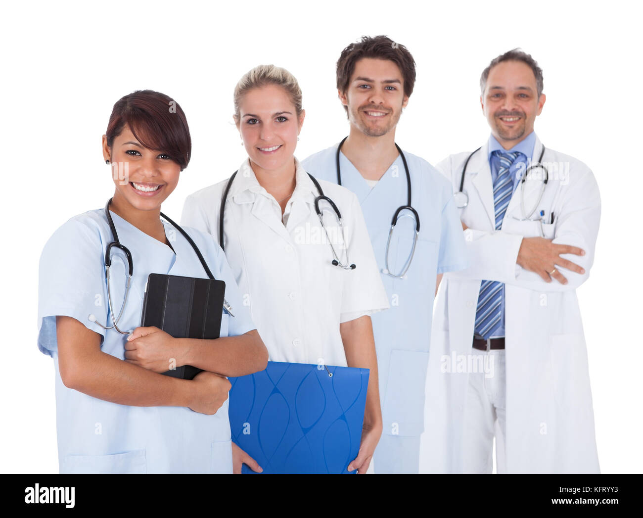 Il gruppo di medici in piedi insieme isolate su sfondo bianco Foto Stock