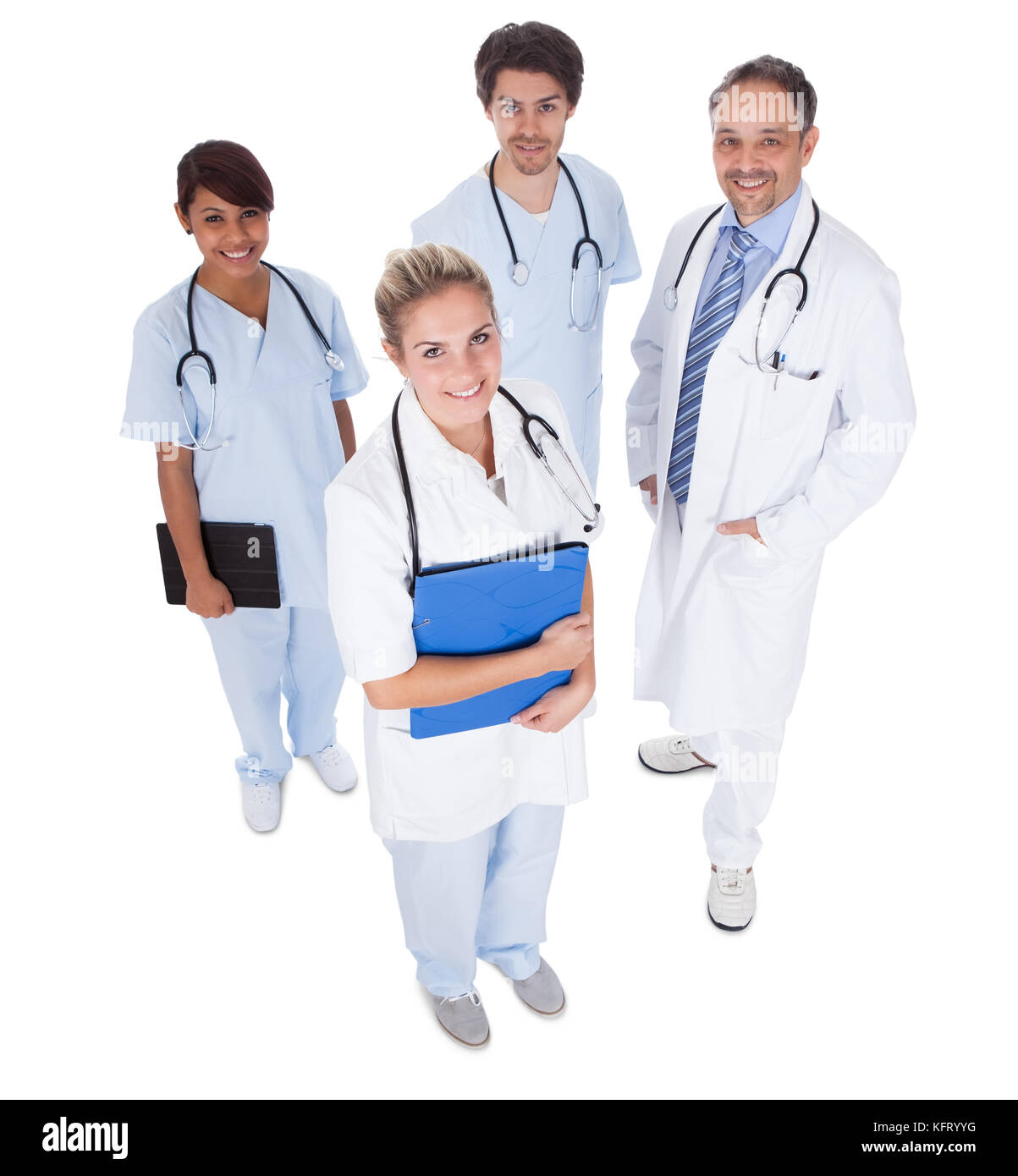 Il gruppo di medici in piedi insieme isolate su sfondo bianco Foto Stock