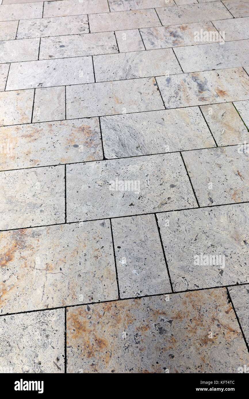 Piastrelle di pietra sul marciapiede, immagine verticale Foto Stock