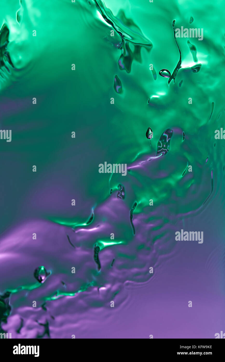 Abstract sfondo colorato. acqua liquida texture closeup Foto Stock