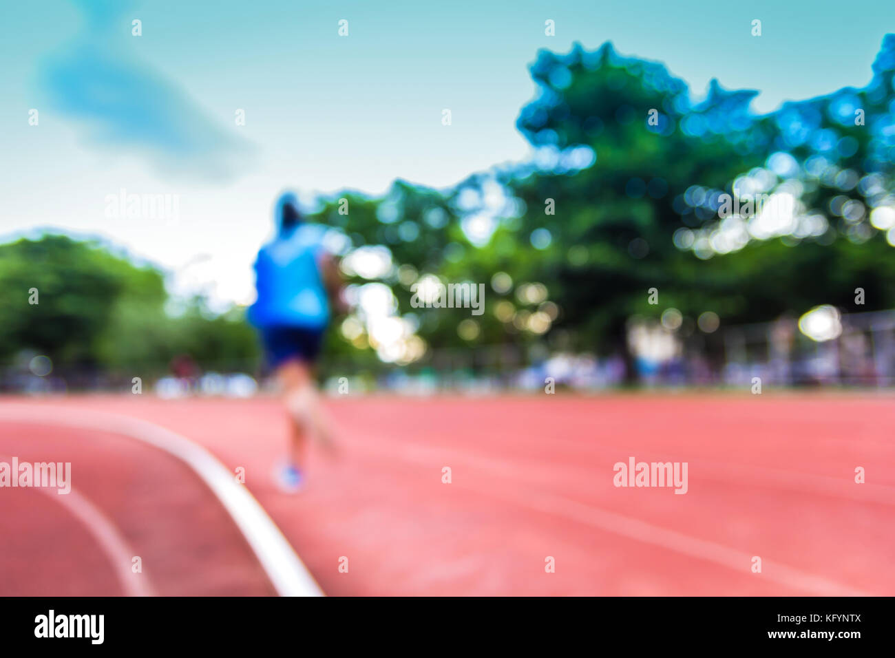 Una sfocatura foto di atletica e via di corsa per uso come sfondo Foto Stock