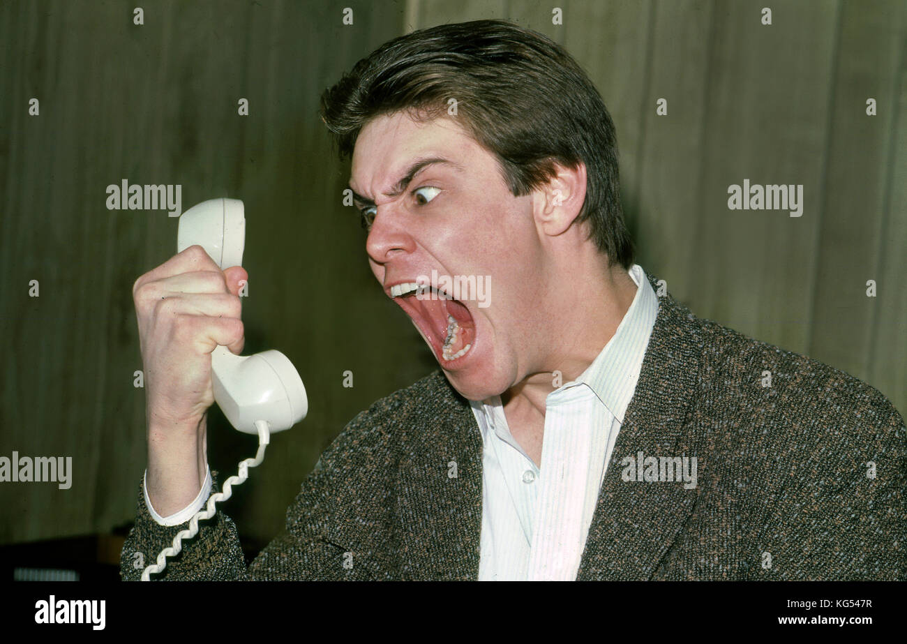 Jim Carrey urlando al telefono Foto Stock