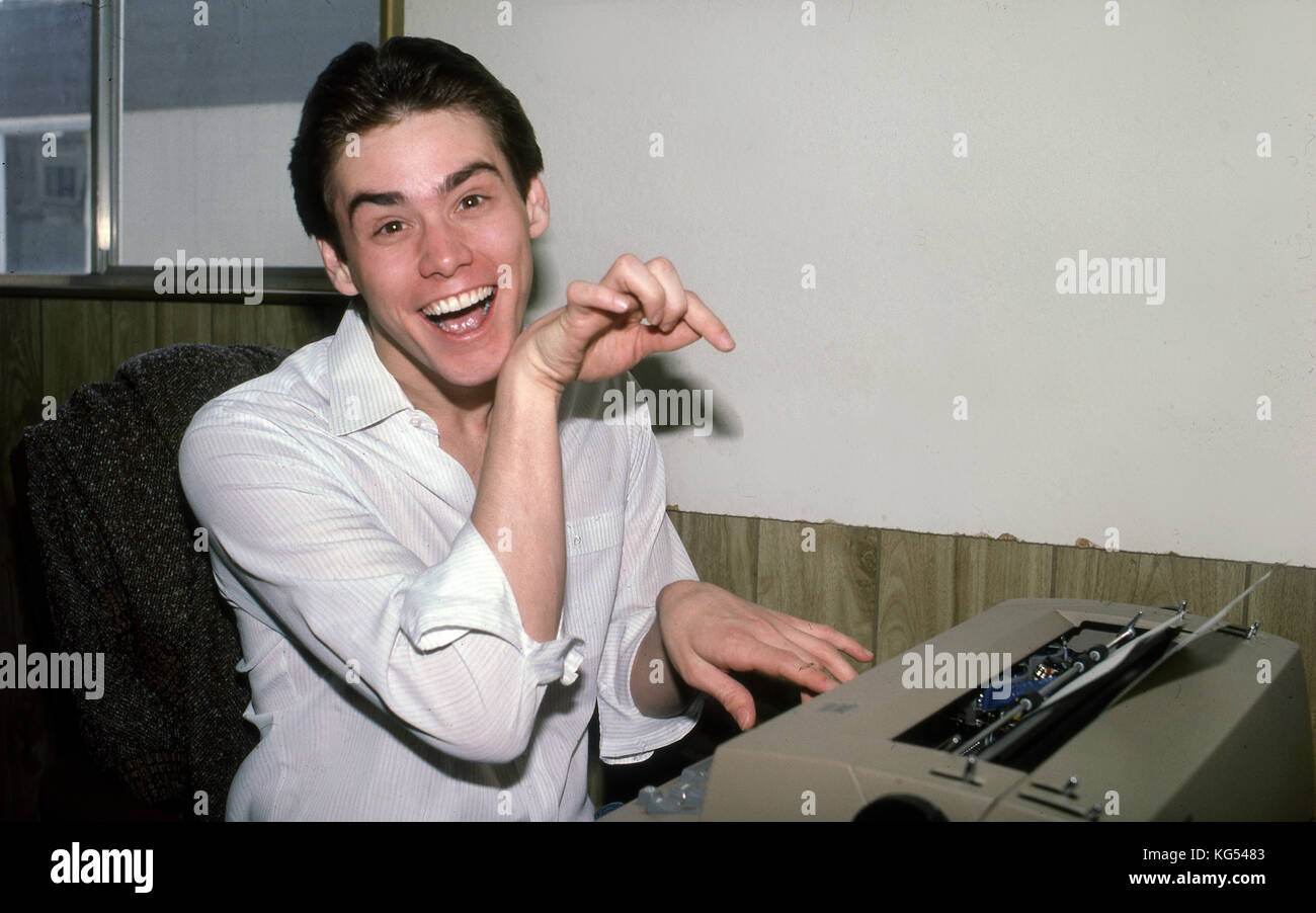 Jim Carrey in ufficio con macchina da scrivere Foto Stock