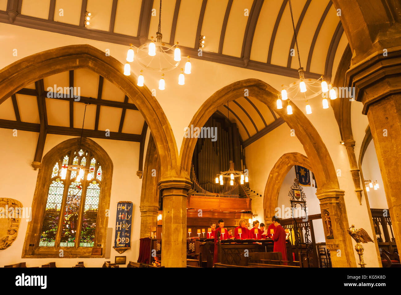 Inghilterra, Oxfordshire, Oxford St Michael presso la porta nord chiesa, coro cantando Foto Stock