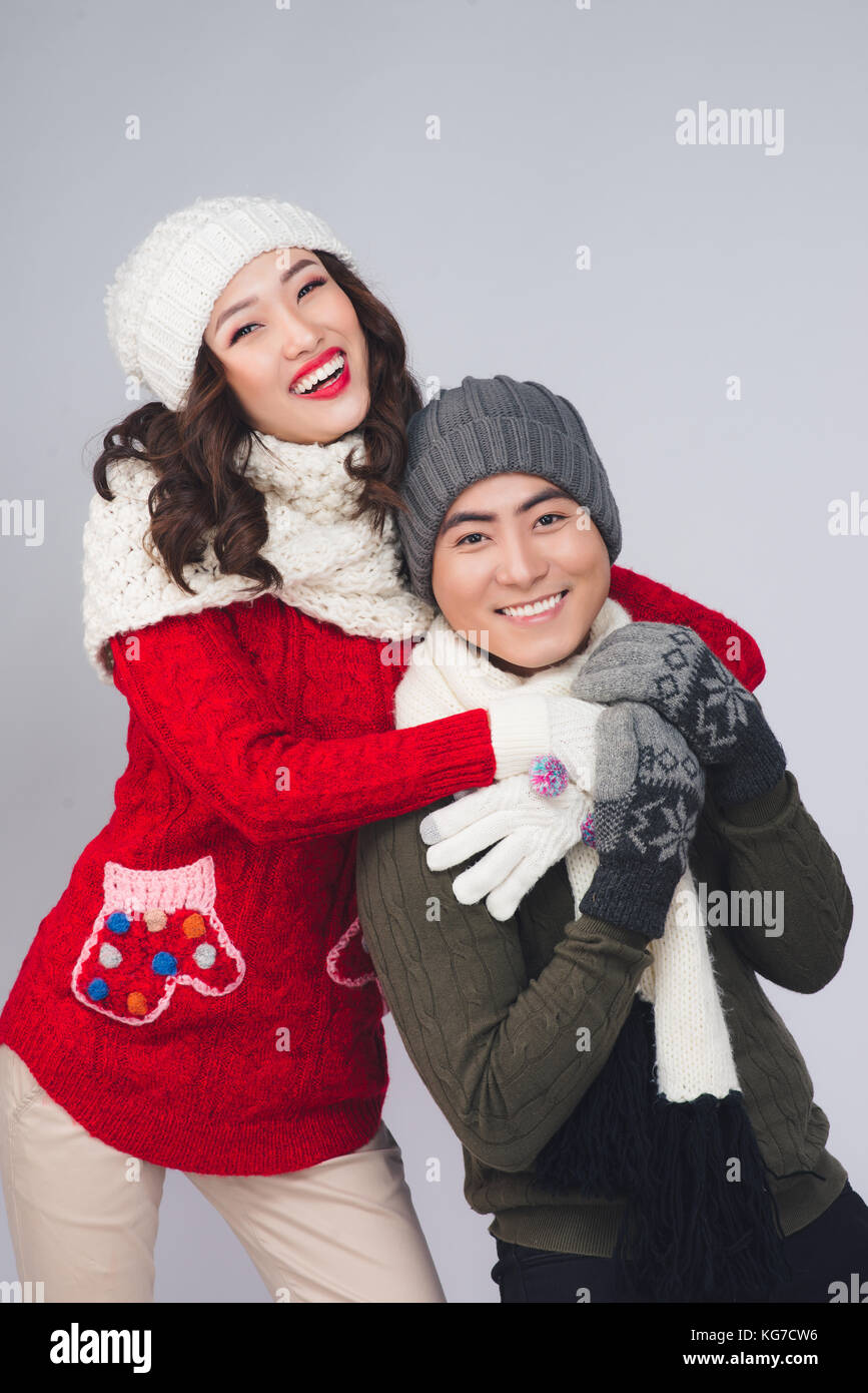 Felice giovani asiatici matura in inverno la moda Foto Stock