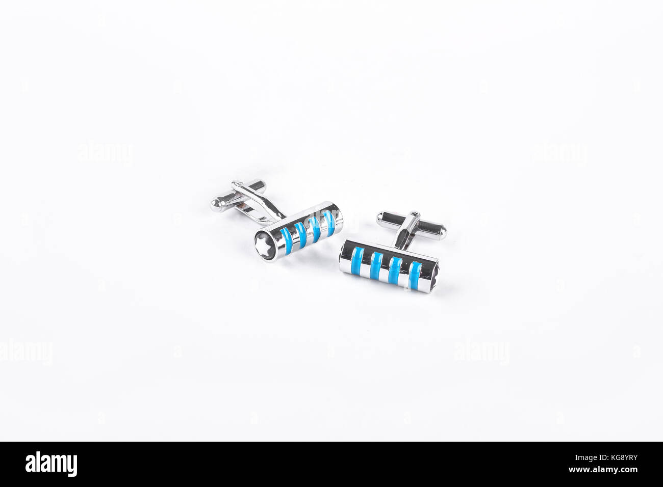 Stallieri cuff link su sfondo isolato. Foto Stock