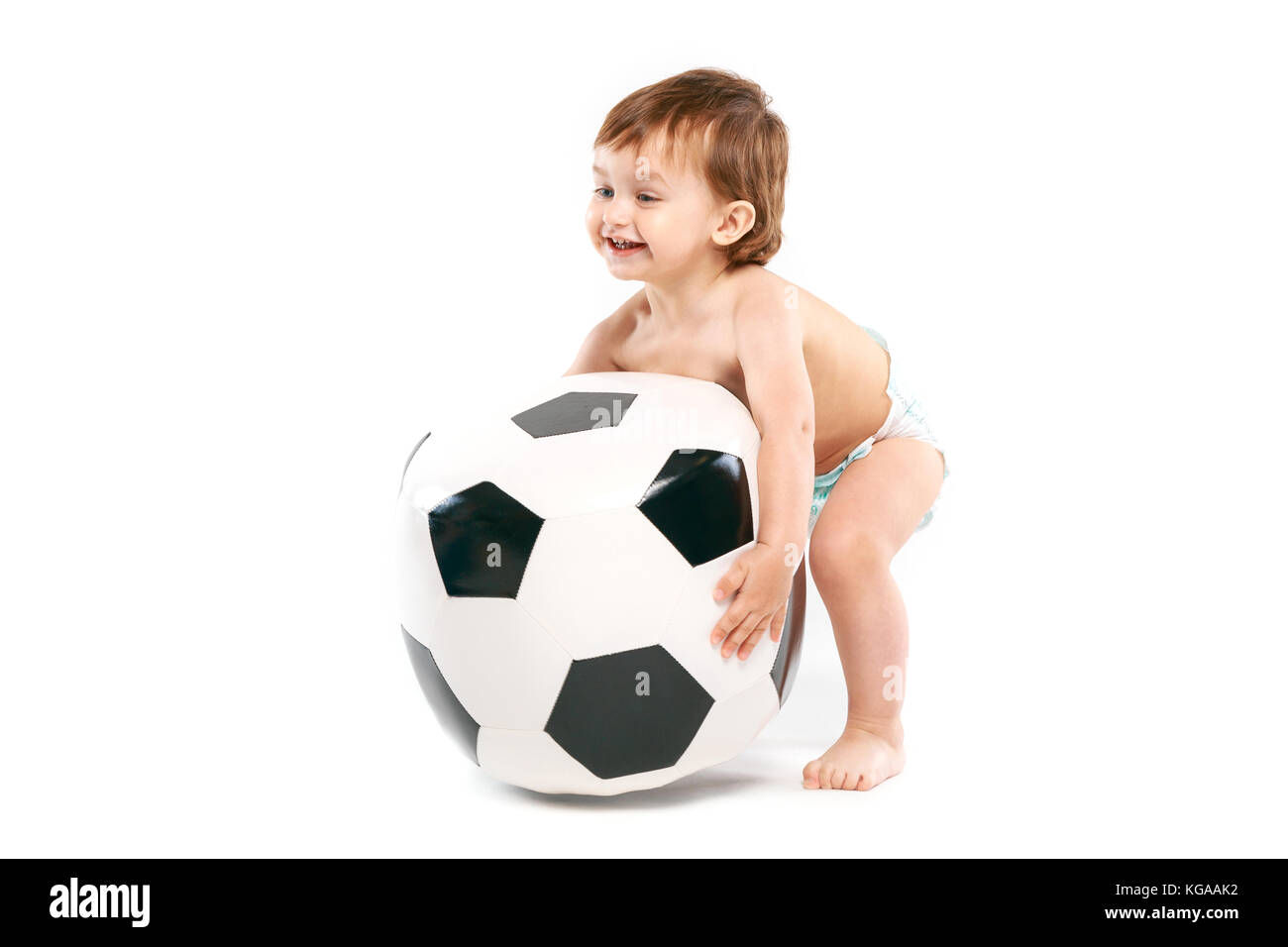 Bambino con pallone da calcio Foto stock - Alamy