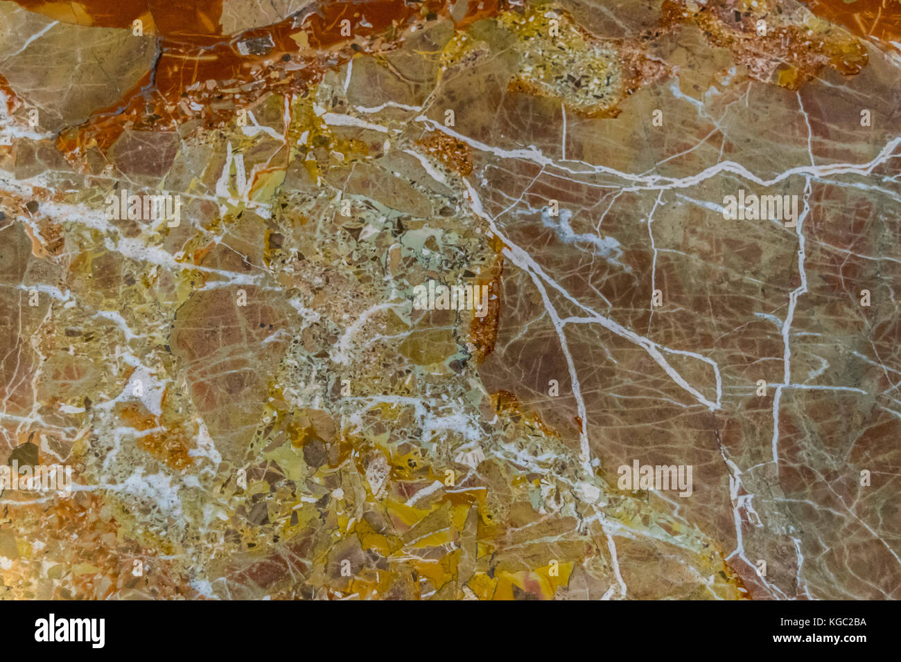 Sfondo marmo, giallo, rosso, bianco vene. colorato astratto modello di marmo closeup. Foto Stock
