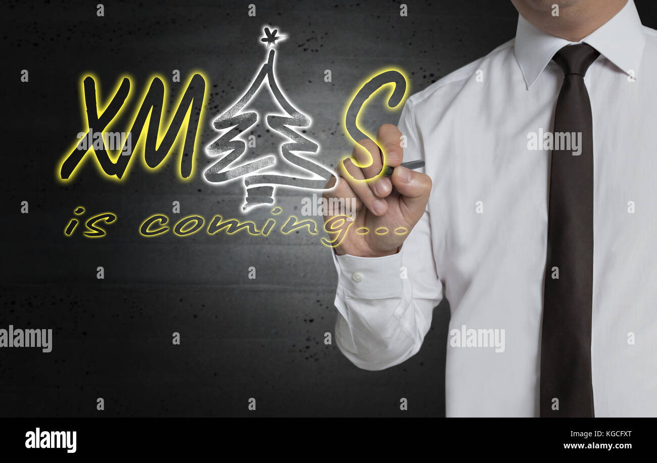 Xmas è scritta da parte dell'imprenditore. Foto Stock