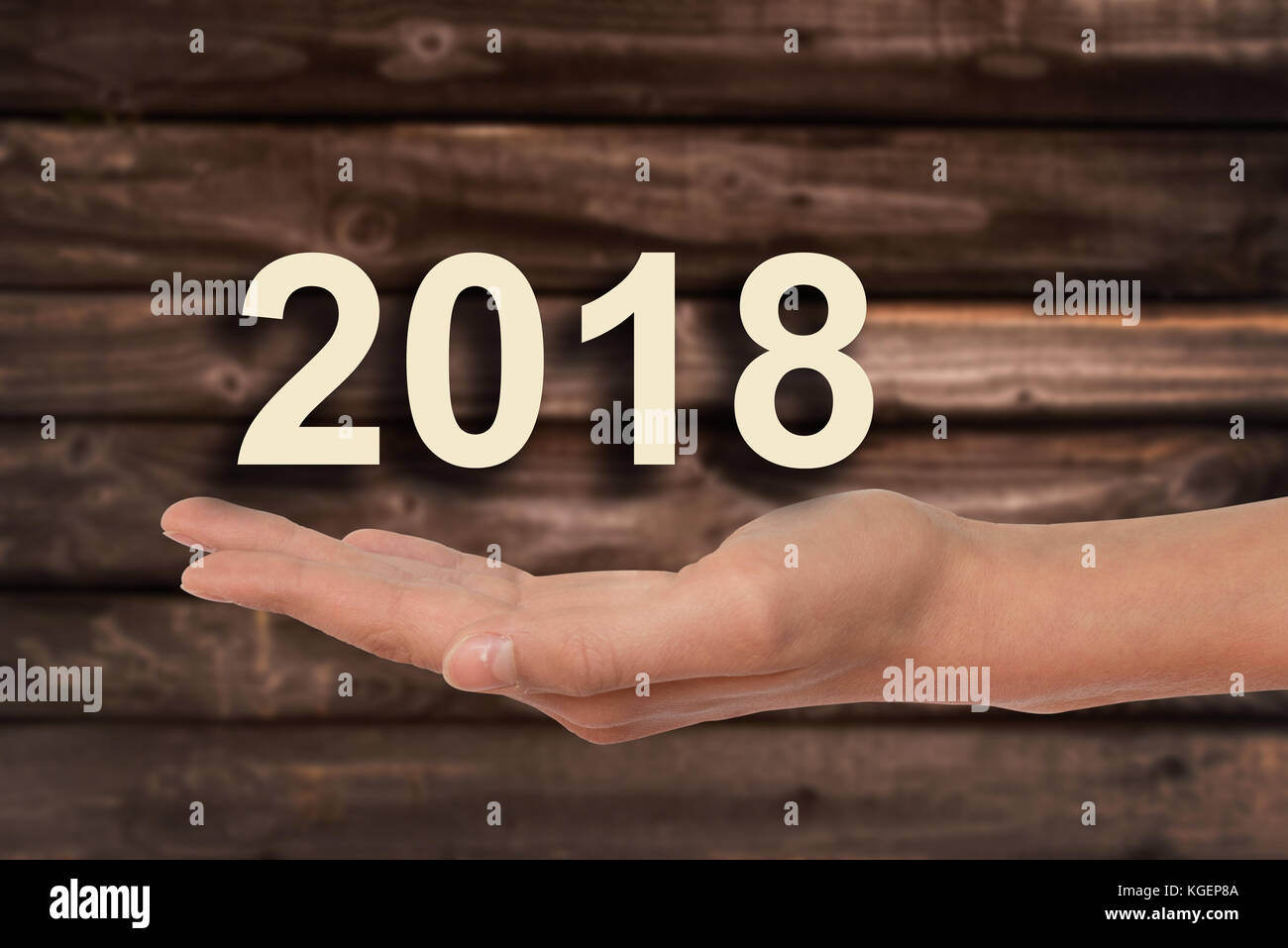 Offerta di mano 2018 numeri, Sfondo legno Foto Stock