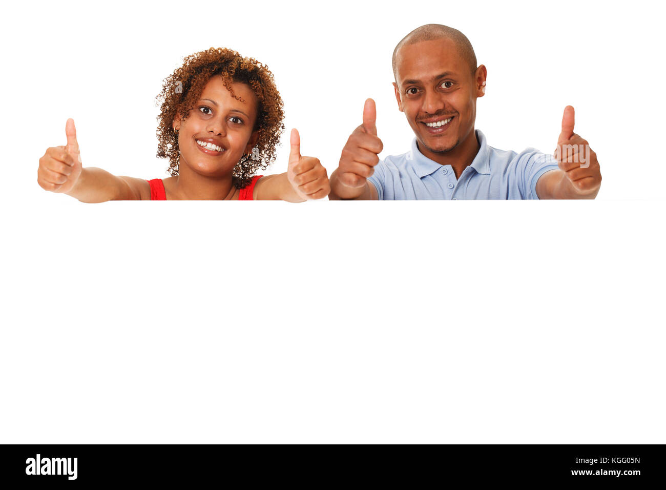 African American giovane mostra Thumbs up con poster in bianco. Foto Stock