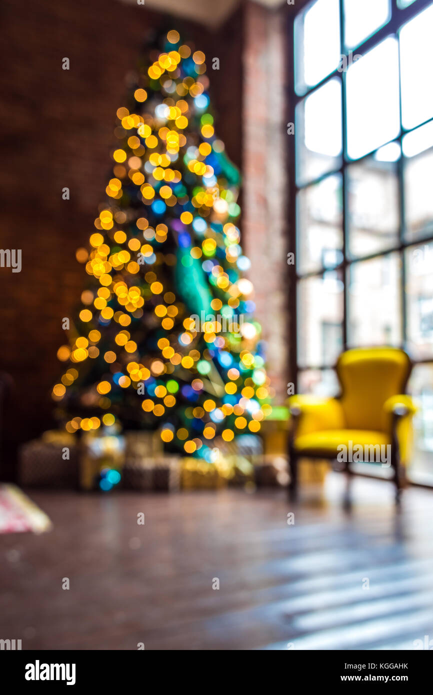 Le luci di Natale sfondo bokeh di fondo con effetto sfocato, anno nuovo anno albero sullo sfondo Foto Stock