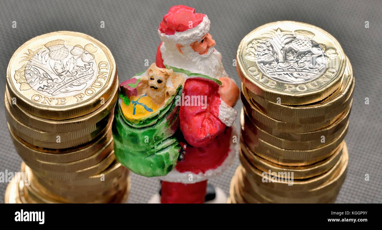 Santa Claus denaro di Natale Foto Stock