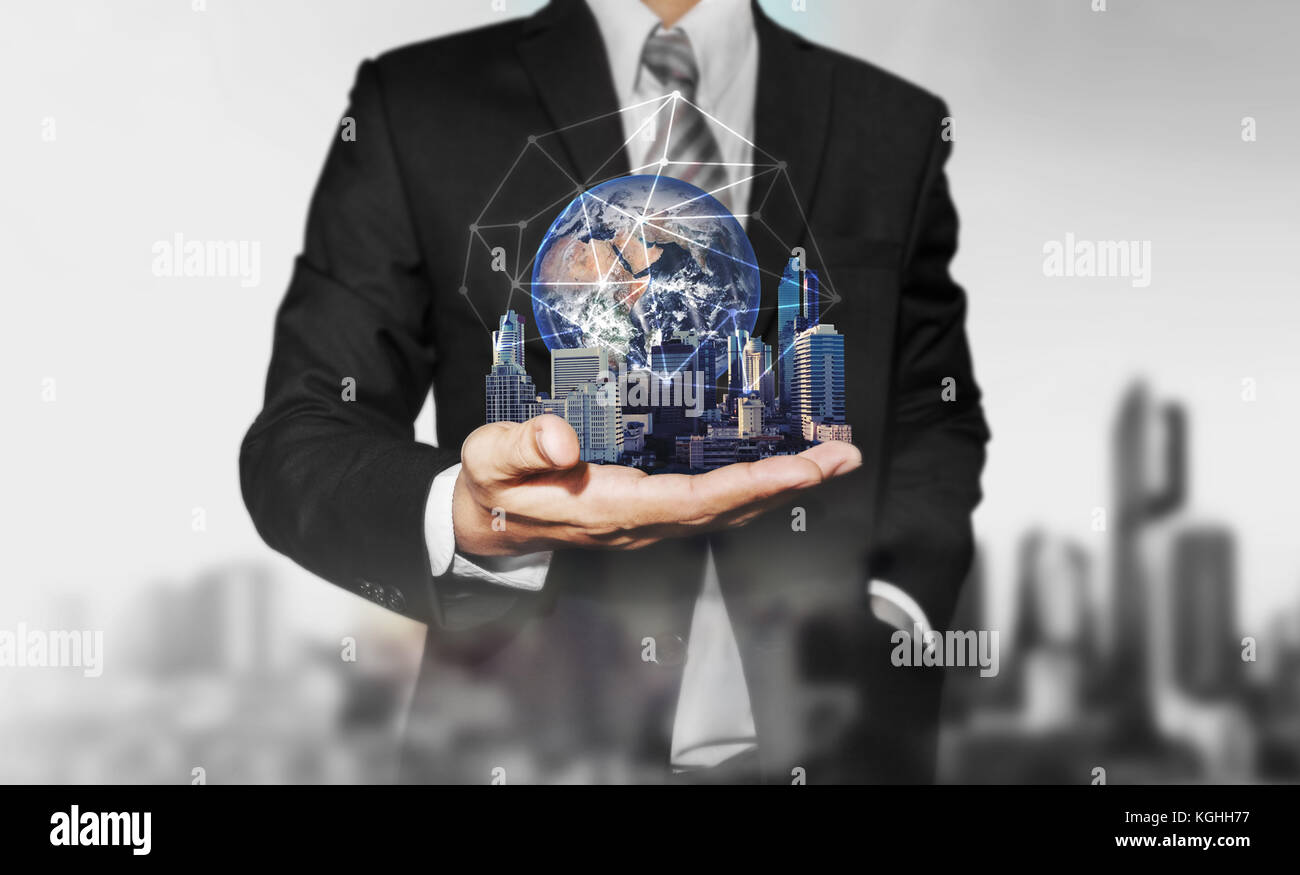 Imprenditore azienda edifici moderni con global network connection. elementi di questa immagine sono arredate dalla NASA Foto Stock