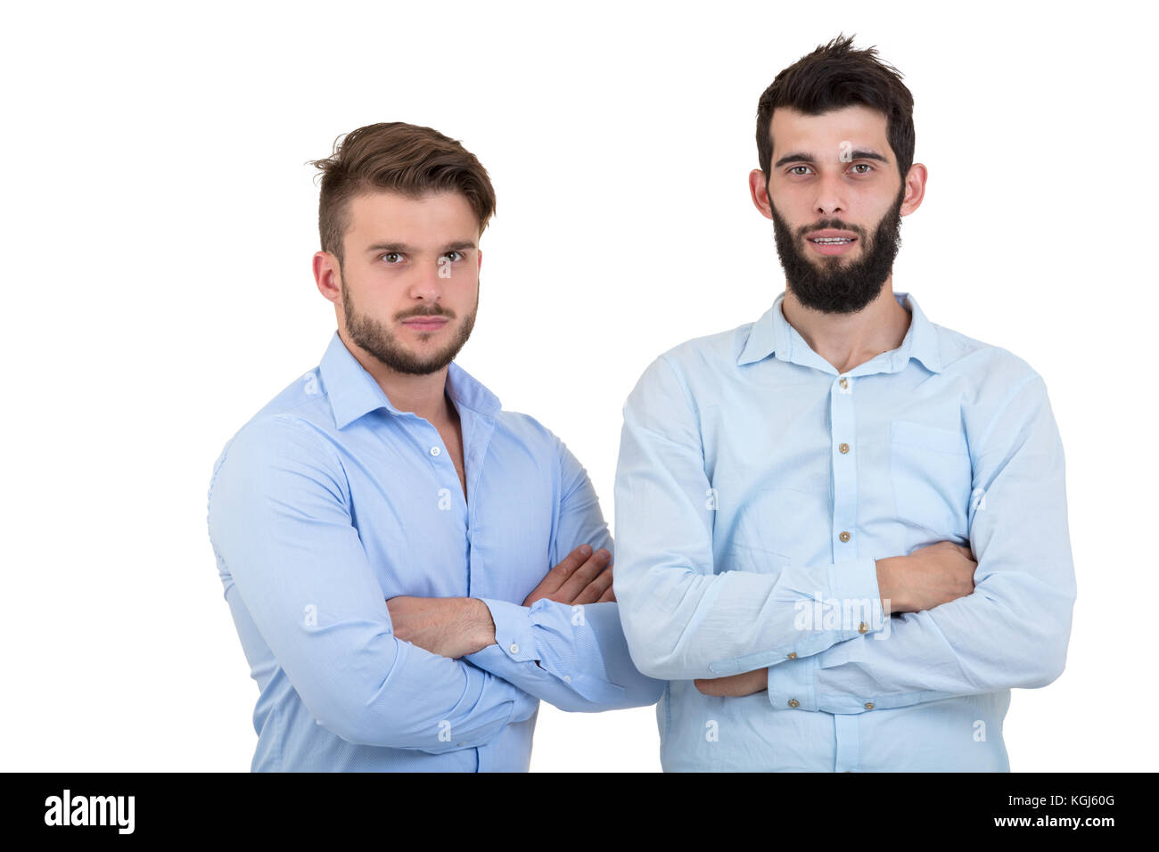 Spalla a spalla con un amico. Due uomini con la barba isolati su sfondo bianco. Foto Stock