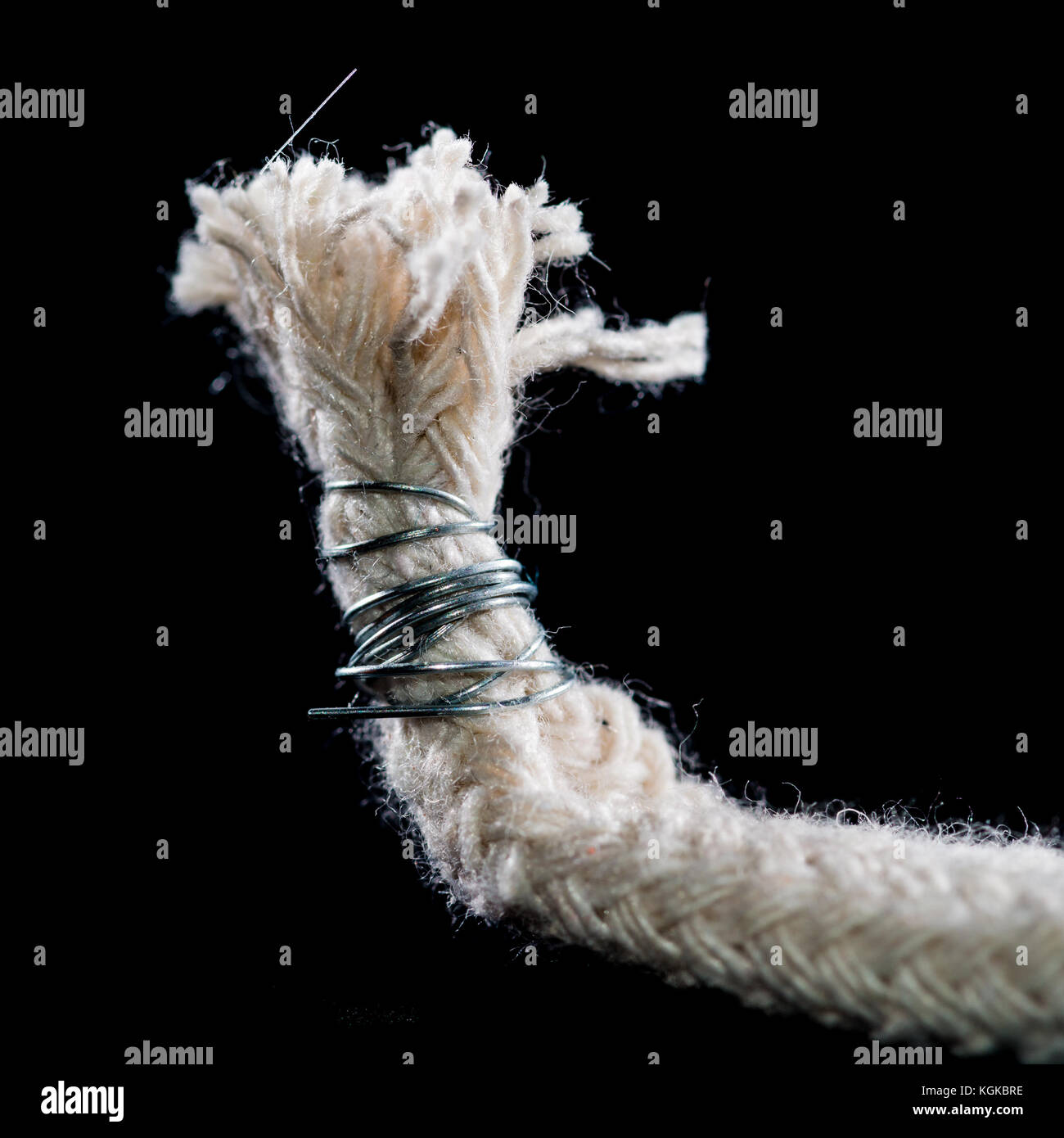 Una macro shot di una lampada ad olio stoppino. Foto Stock