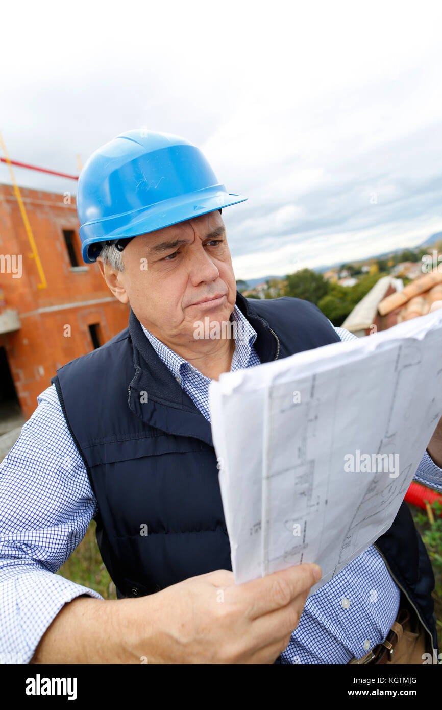 Costruzione manager controllo edificio progetto sul sito Foto Stock