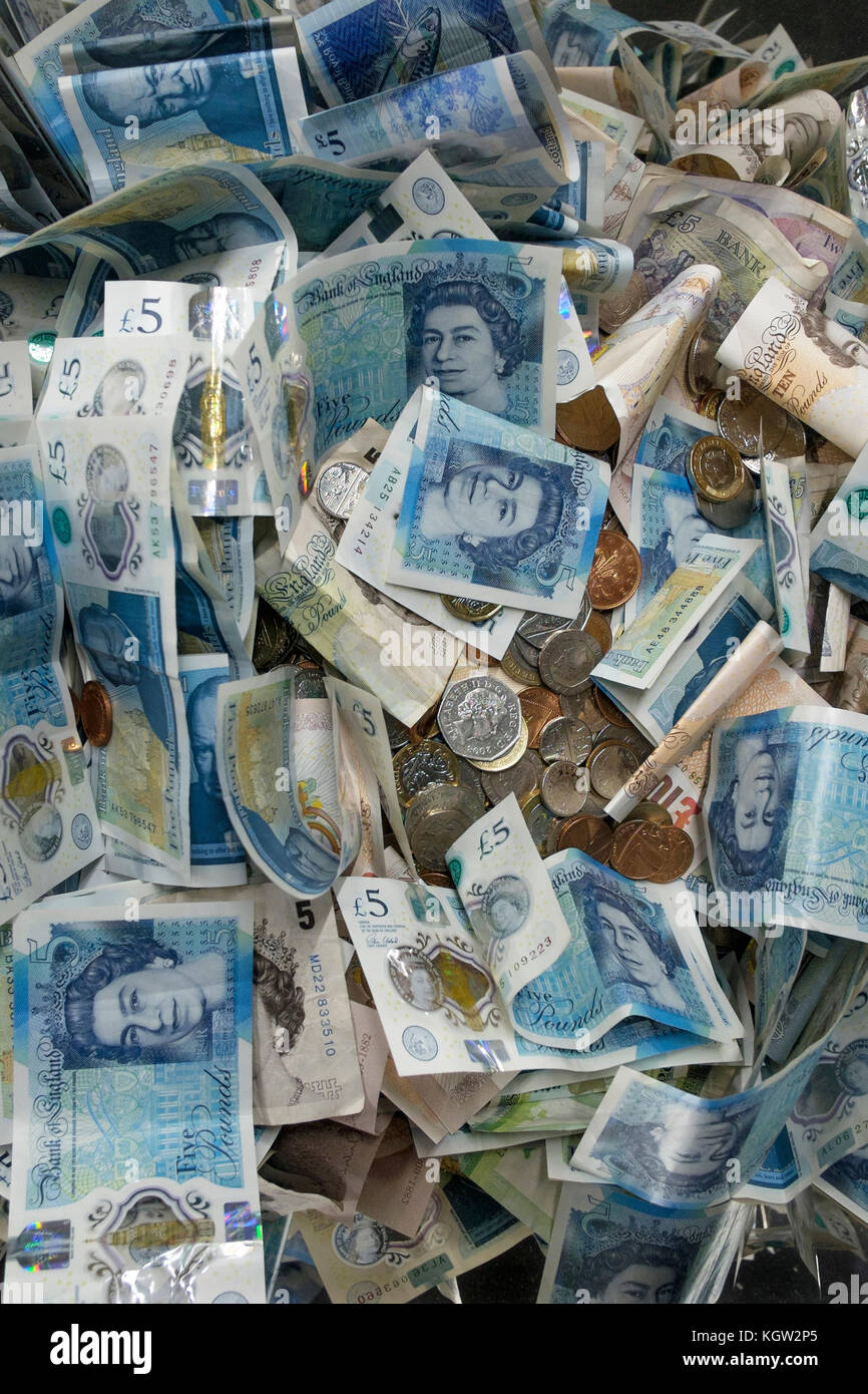 Un assortimento di valuta britannica Foto Stock
