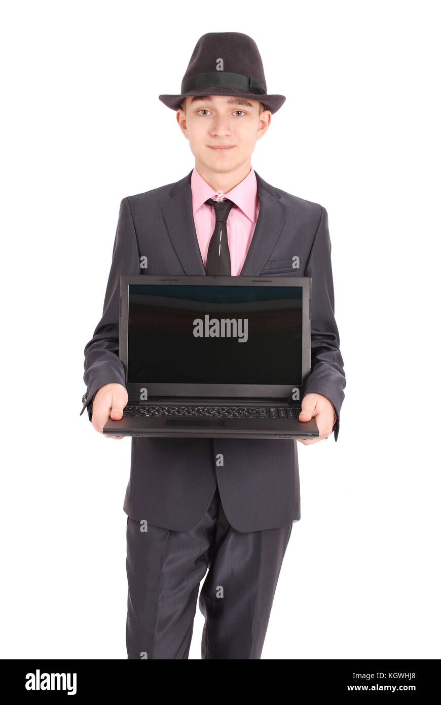 A piena lunghezza Ritratto di fiducioso imprenditore maturo con un laptop in formali in piedi isolato su sfondo bianco Foto Stock