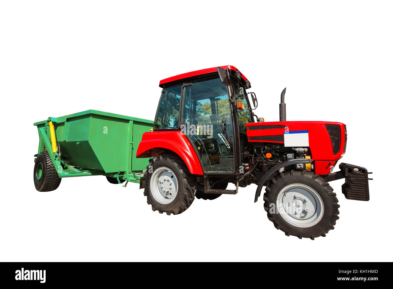 Nuovo trattore agricolo e rimorchio isolato su sfondo bianco con tracciato di ritaglio Foto Stock
