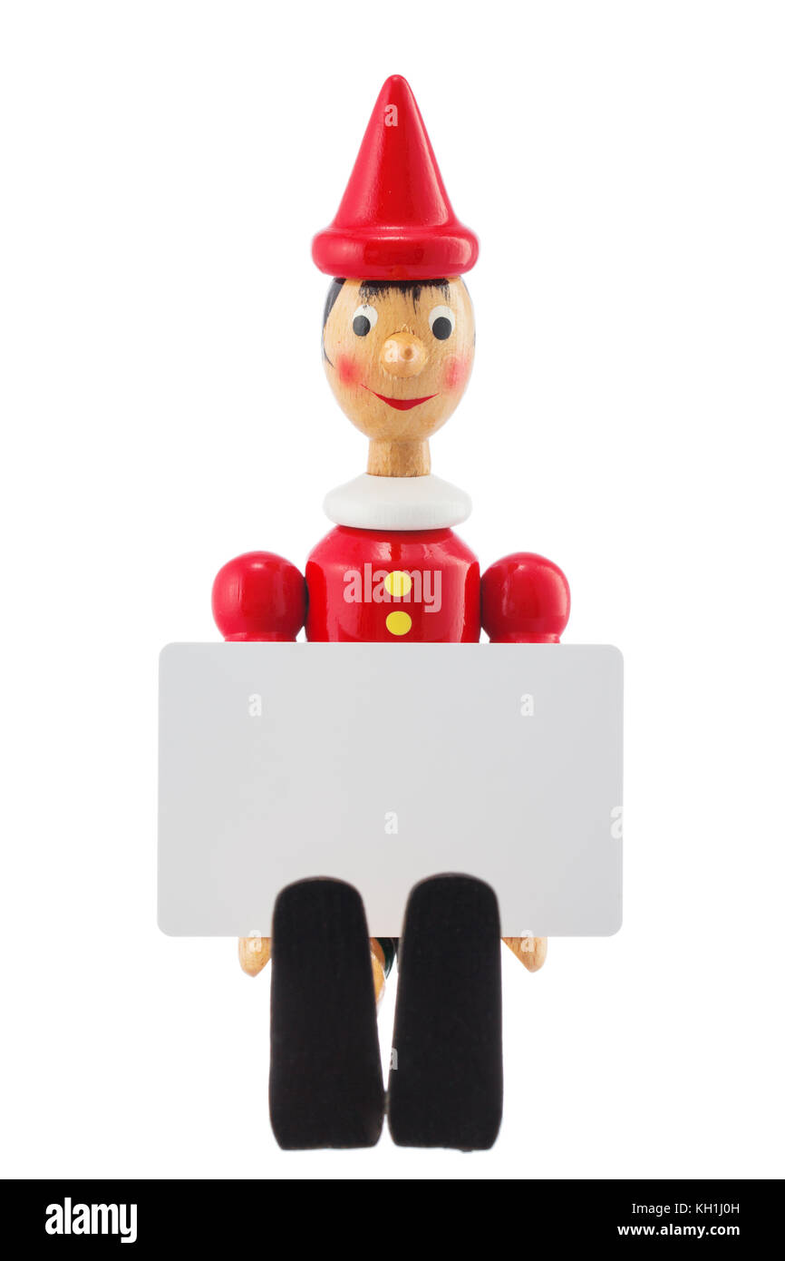 Pinocchio bugiardo toy statua e la scheda vuota per testo studio isolato su sfondo bianco Foto Stock