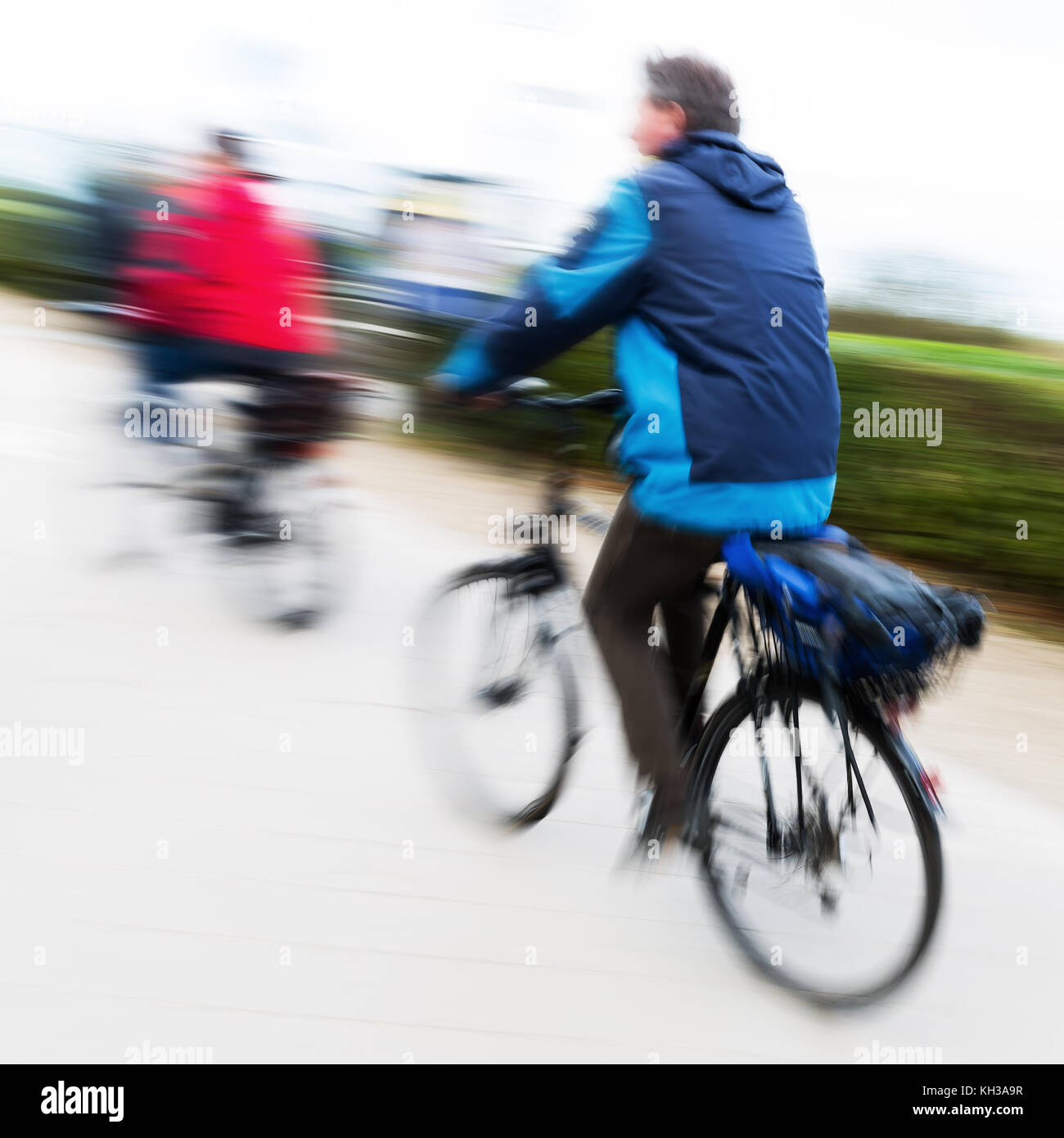 Foto di ciclisti in motion blur Foto Stock