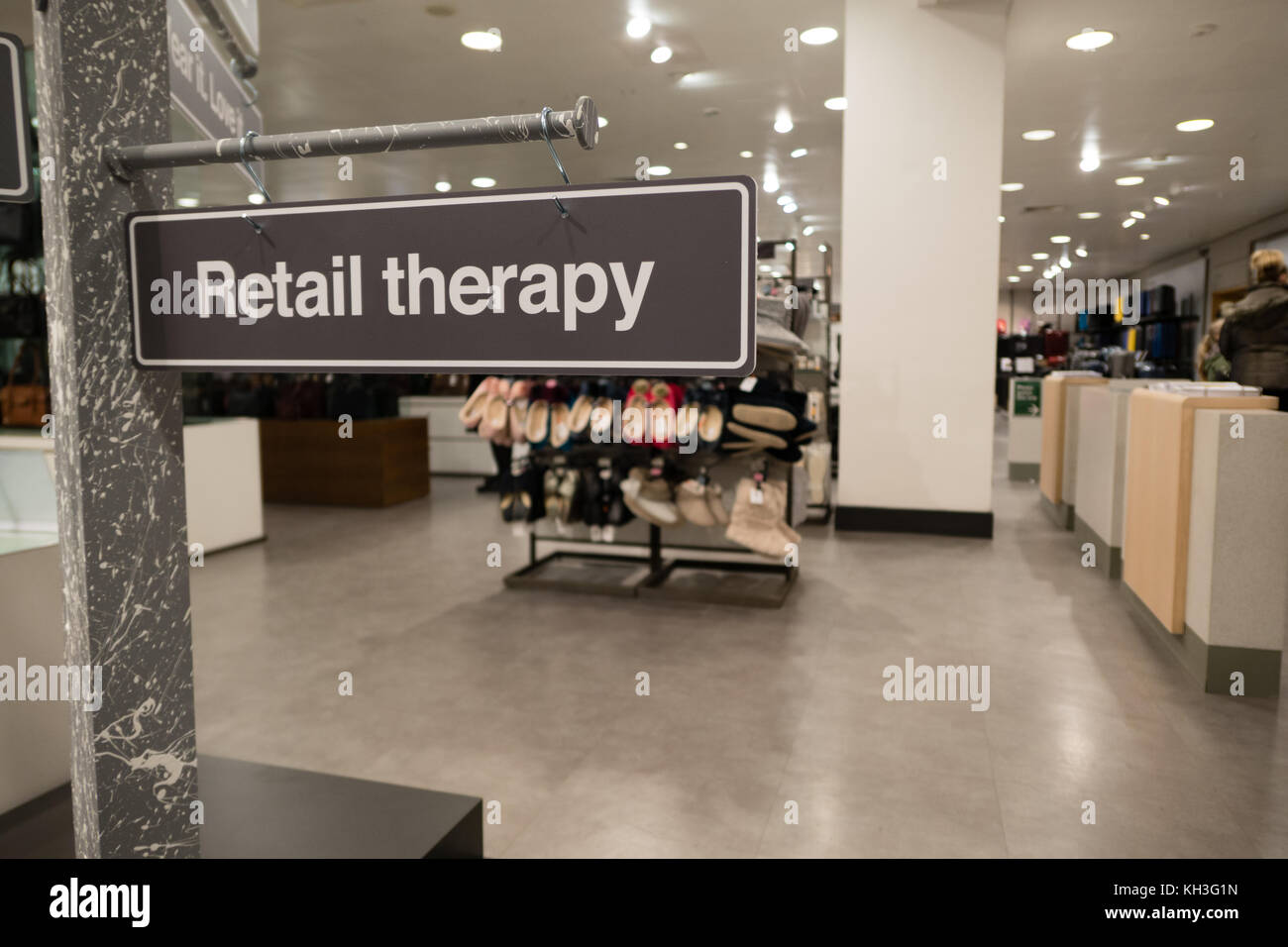 Una lettura del segno "terapia di coda' in John Lewis, Edimburgo Foto Stock