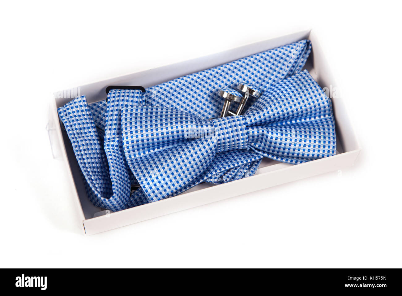 Close-up di gemelli e il filtro bow tie accessori moda in scatola di luce su sfondo bianco Foto Stock