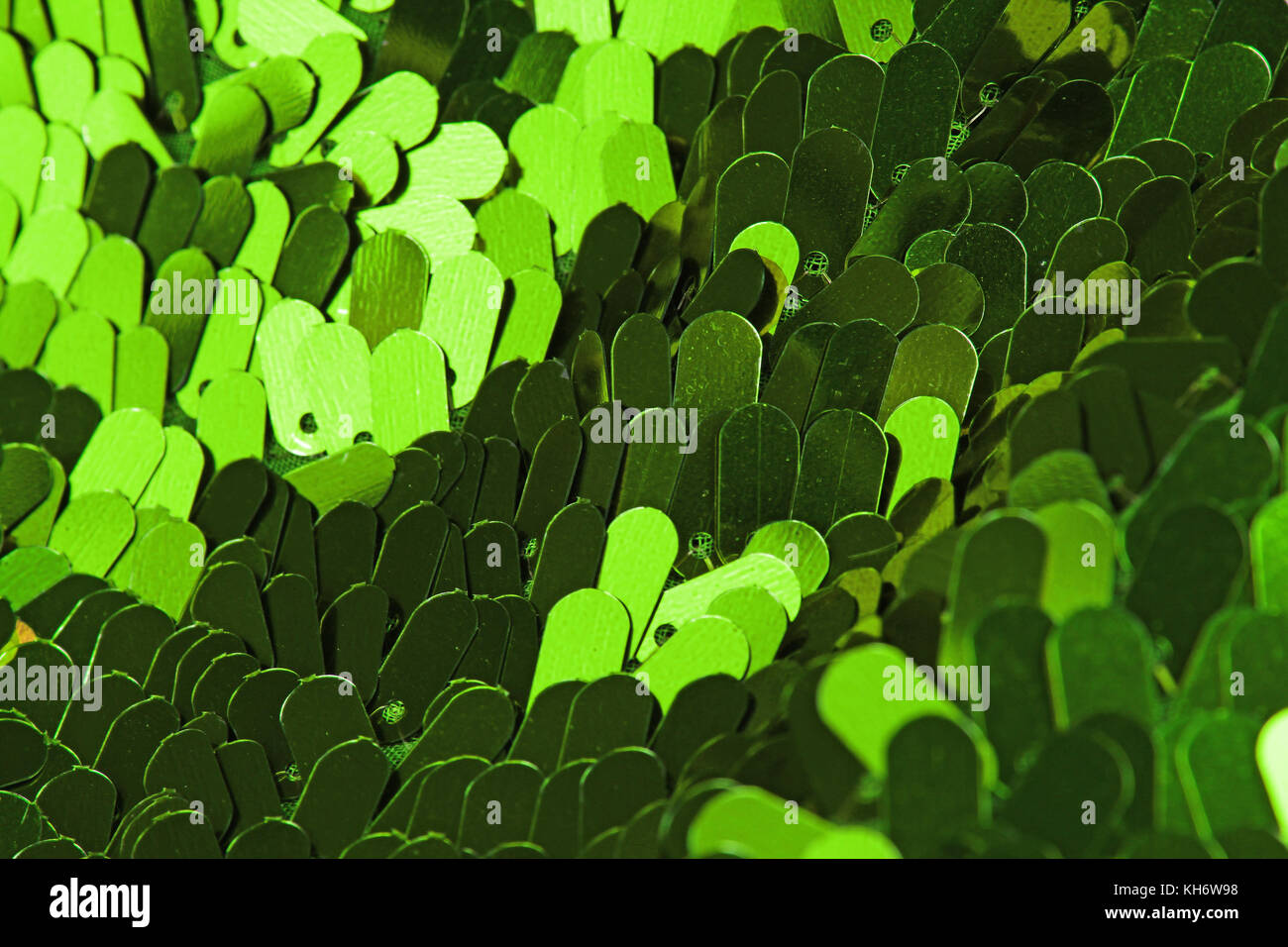 Spangle, sequin pailette sfondo. Abito a specchio panno di materiale modello di texture. Sartoria concetto di cucitura. Shiny specchiata tessuto di moda. Shiny cl Foto Stock