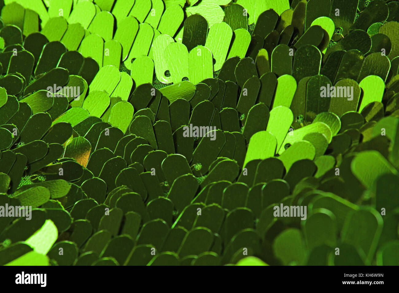 Spangle, sequin pailette sfondo. Abito a specchio panno di materiale modello di texture. Sartoria concetto di cucitura. Shiny specchiata tessuto di moda. Shiny cl Foto Stock