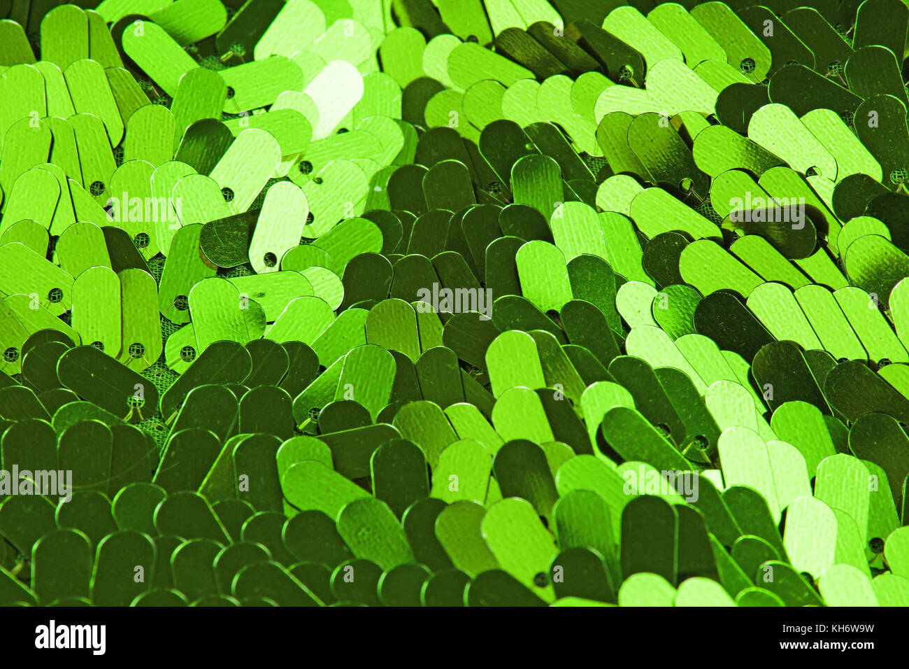 Spangle, sequin pailette sfondo. Abito a specchio panno di materiale modello di texture. Sartoria concetto di cucitura. Shiny specchiata tessuto di moda. Shiny cl Foto Stock