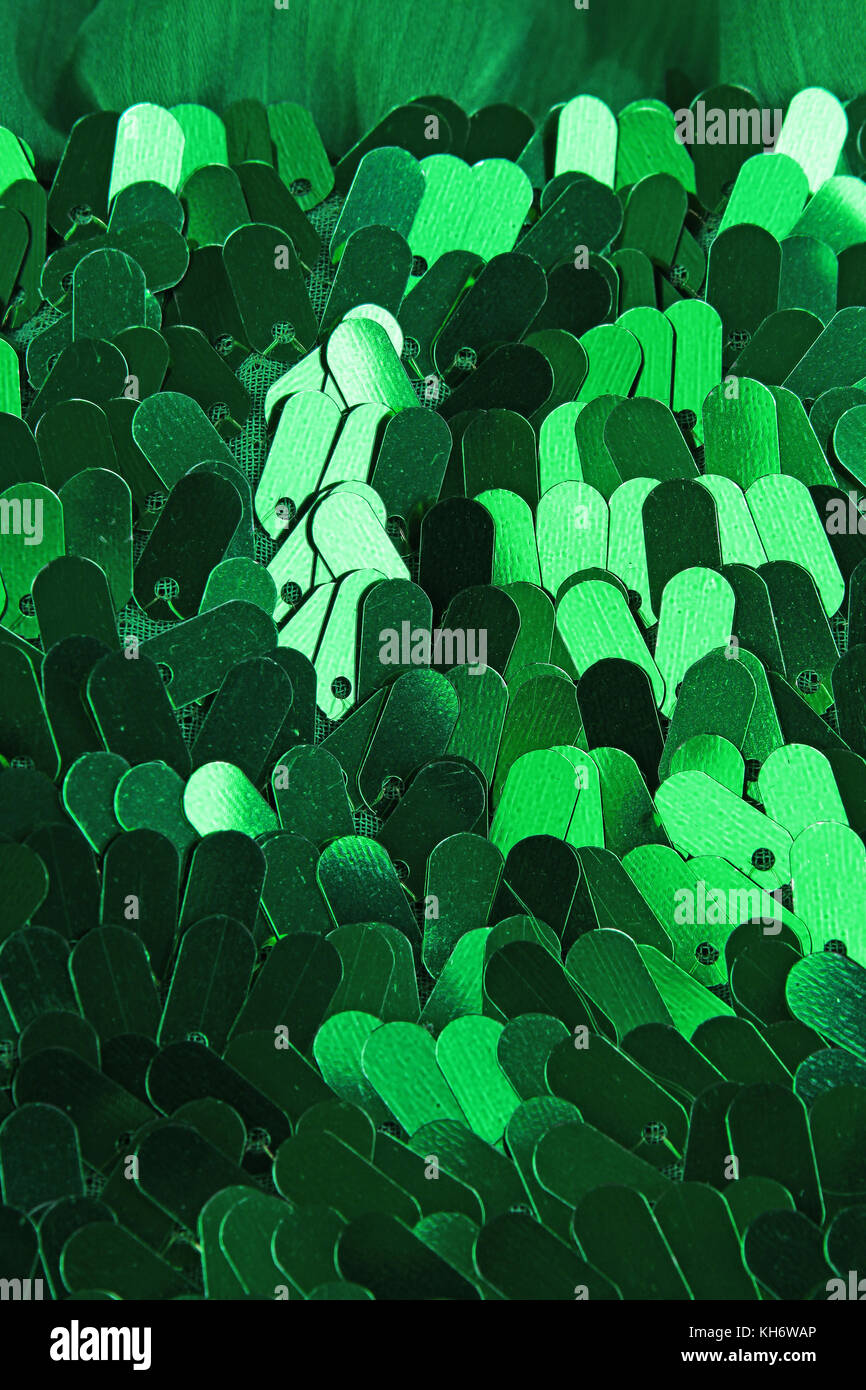 Spangle, sequin pailette sfondo. Abito a specchio panno di materiale modello di texture. Sartoria concetto di cucitura. Shiny specchiata tessuto di moda. Shiny cl Foto Stock