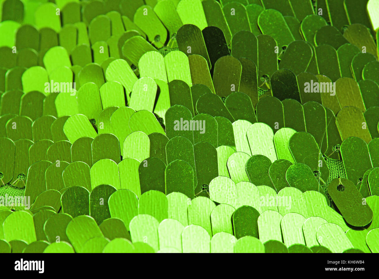 Spangle, sequin pailette sfondo. Abito a specchio panno di materiale modello di texture. Sartoria concetto di cucitura. Shiny specchiata tessuto di moda. Shiny cl Foto Stock