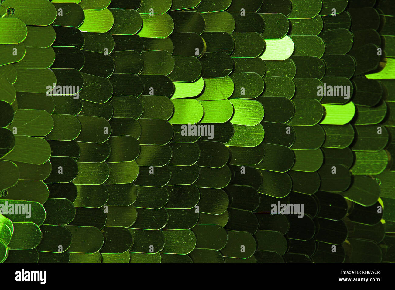 Spangle, sequin pailette sfondo. Abito a specchio panno di materiale modello di texture. Sartoria concetto di cucitura. Shiny specchiata tessuto di moda. Shiny cl Foto Stock