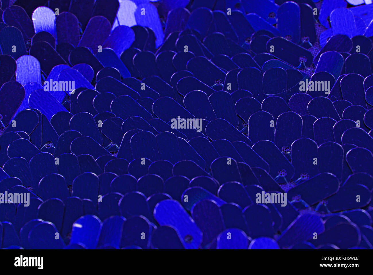 Spangle, sequin pailette sfondo. Abito a specchio panno di materiale modello di texture. Sartoria concetto di cucitura. Shiny specchiata tessuto di moda. Shiny cl Foto Stock