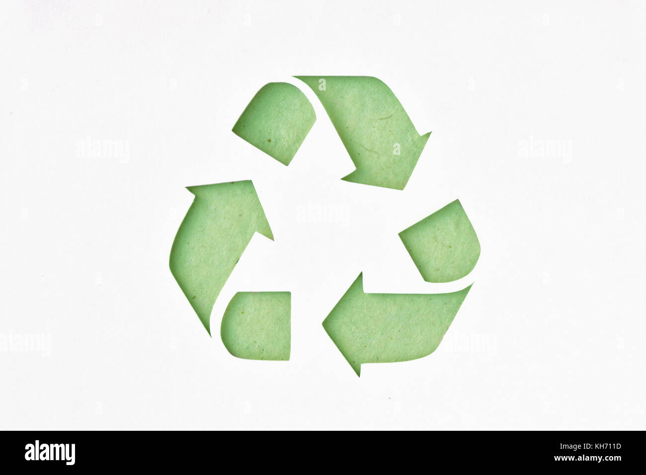 Simbolo recyclig su carta riciclata Foto Stock