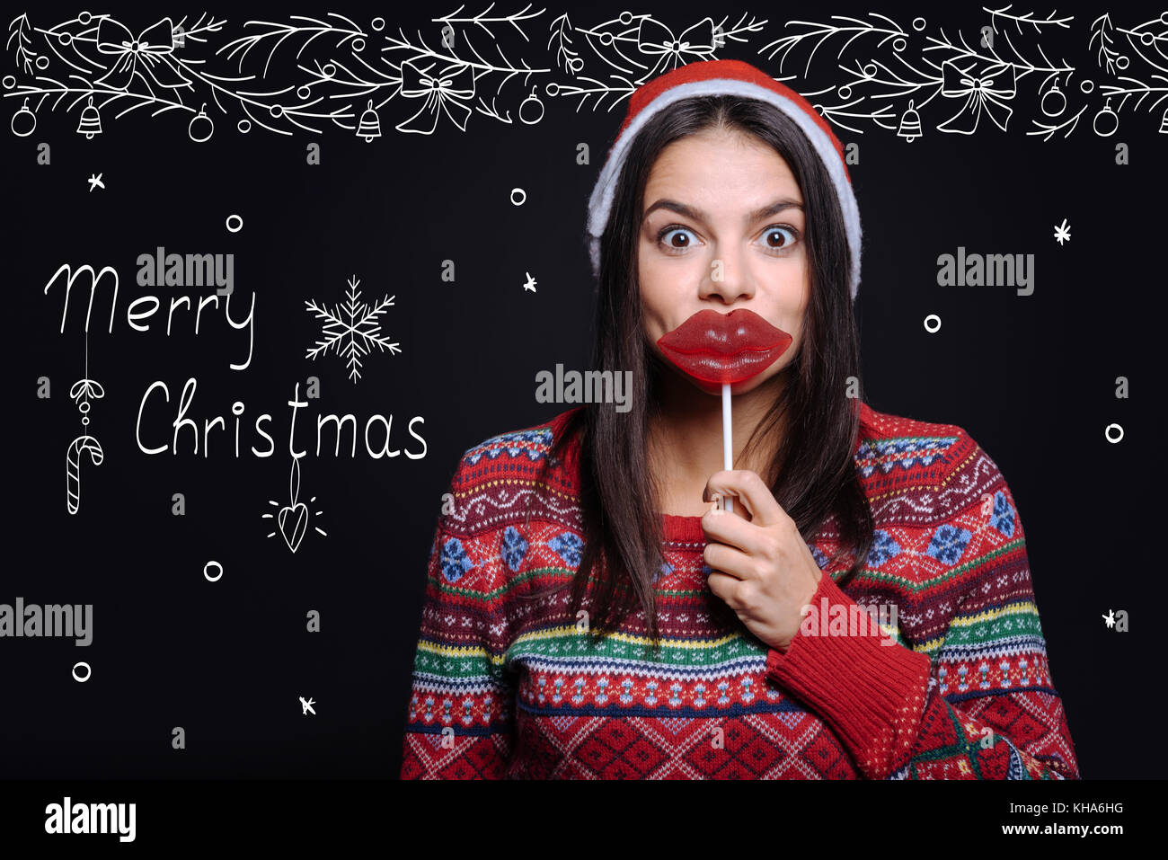 Merry ragazza positiva per giocare con il lecca-lecca Foto Stock