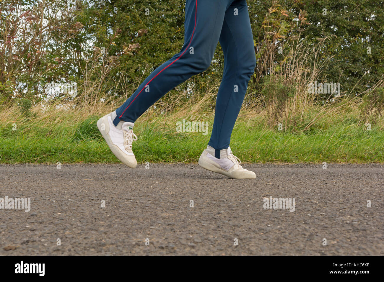 Per chi ama fare jogging a piedi, gambe e formatori Foto Stock