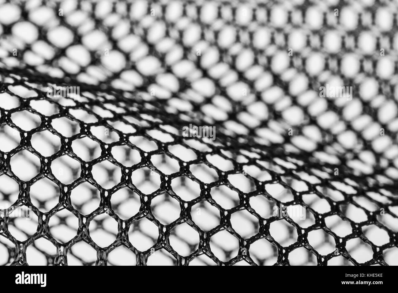 Abstract in bianco e nero texture da netting. dettaglio artistico di celle esagonali. concetto per la scienza, ricerca, tecnologia e industria. Foto Stock