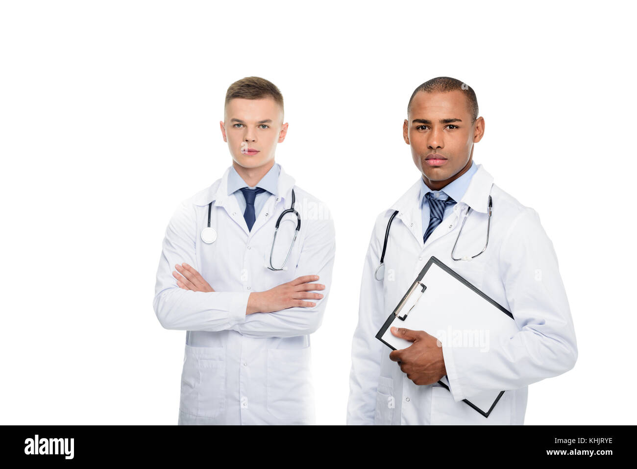Multietnica medici di sesso maschile con stetoscopi Foto Stock