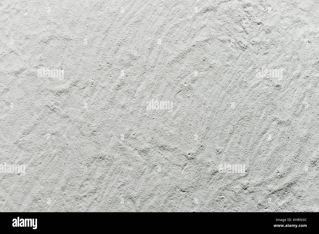 Textured sullo sfondo di un muro bianco con piccoli fori Foto Stock