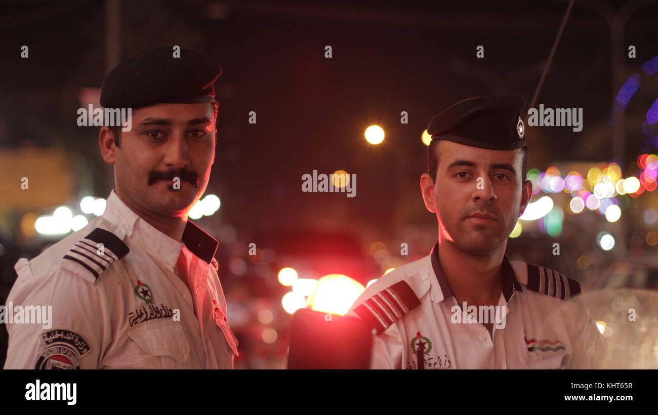 Bagdad traffico poliziotti Foto Stock