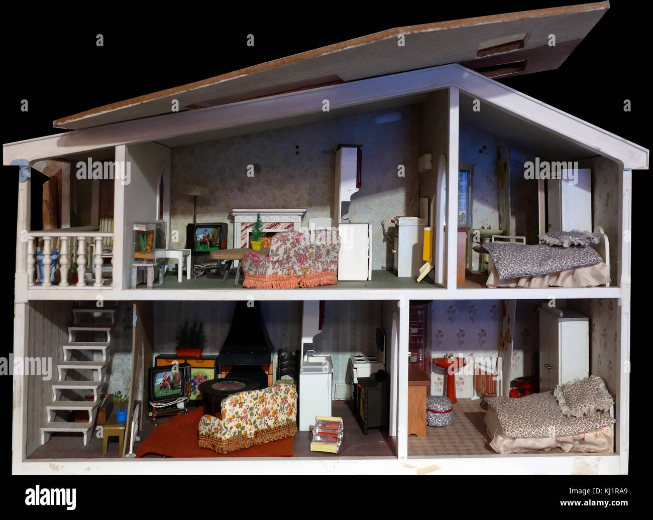 Casa delle bambole sotto forma di appartamenti per le vacanze in stile anni ottanta inglese Foto Stock