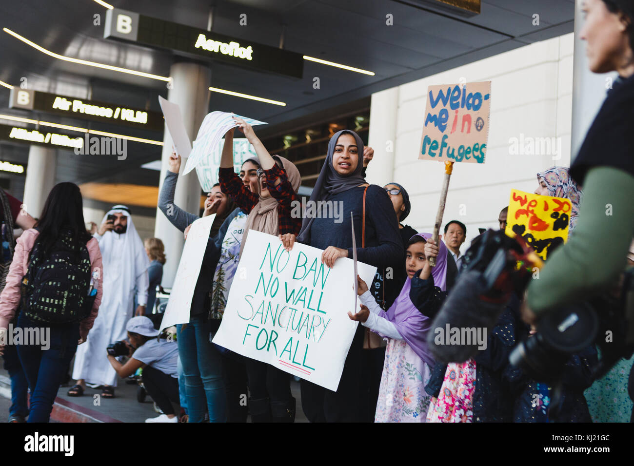 Manifestanti lotta contro Donald Trump musulmana del divieto di viaggio Foto Stock