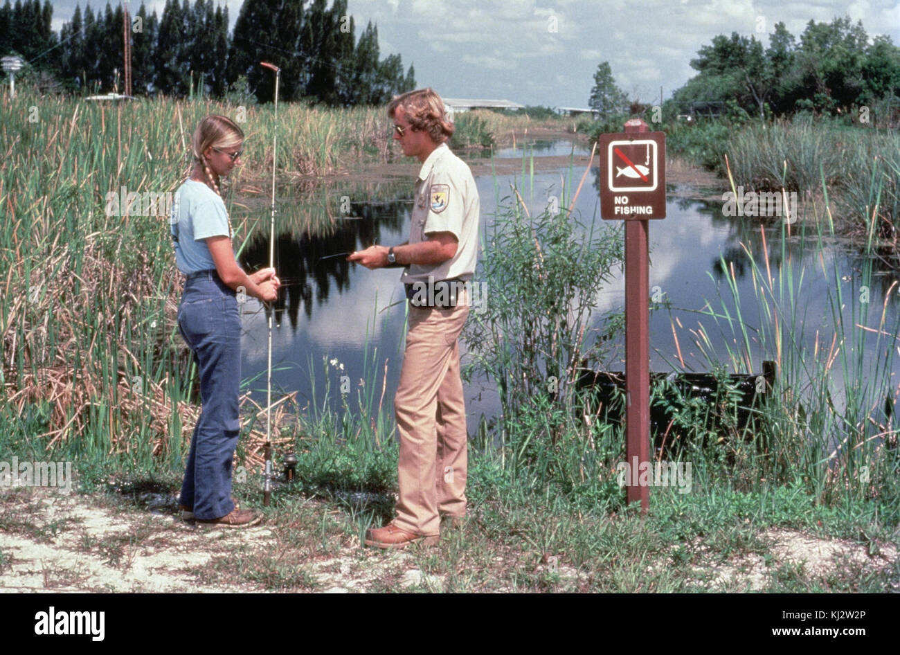 Controllo licenza di pesca Foto Stock