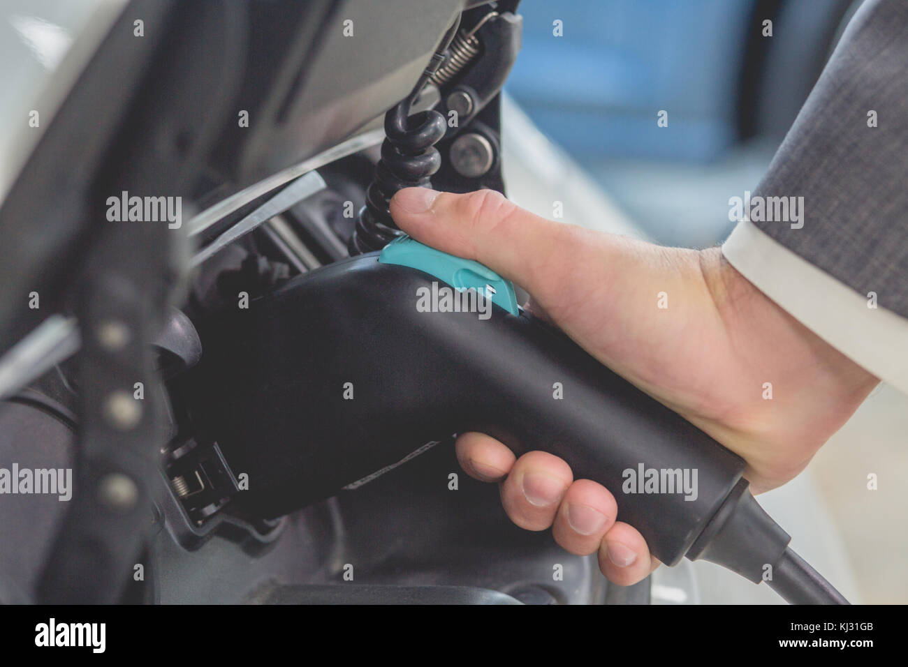 Bianco elettro di carica in auto le celle della batteria. Foto Stock