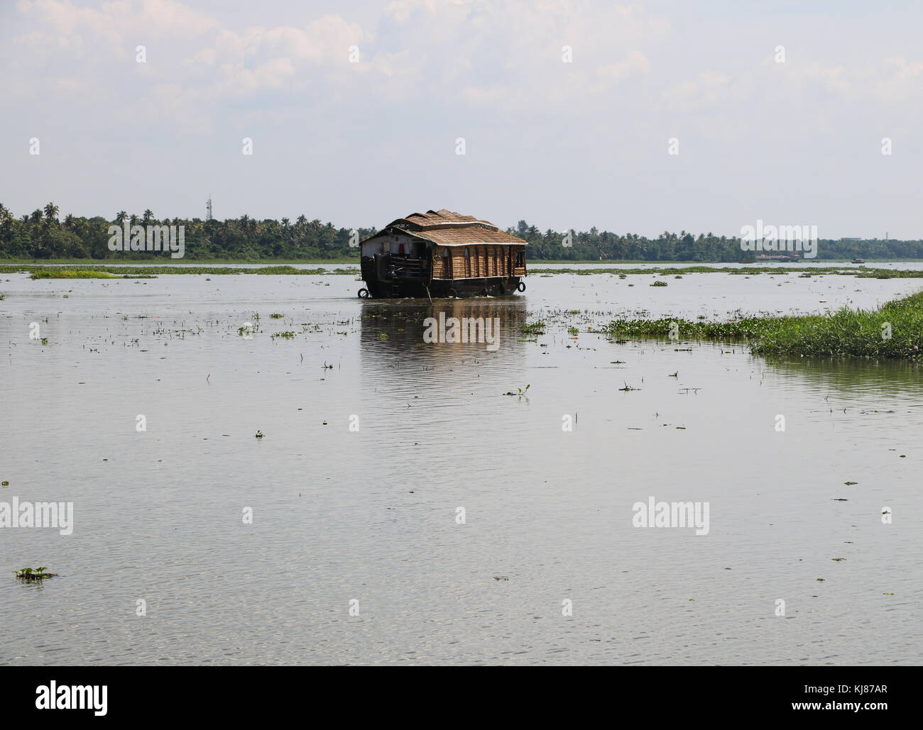 Il Kerala la casa tradizionale in barca nelle backwaters Foto Stock